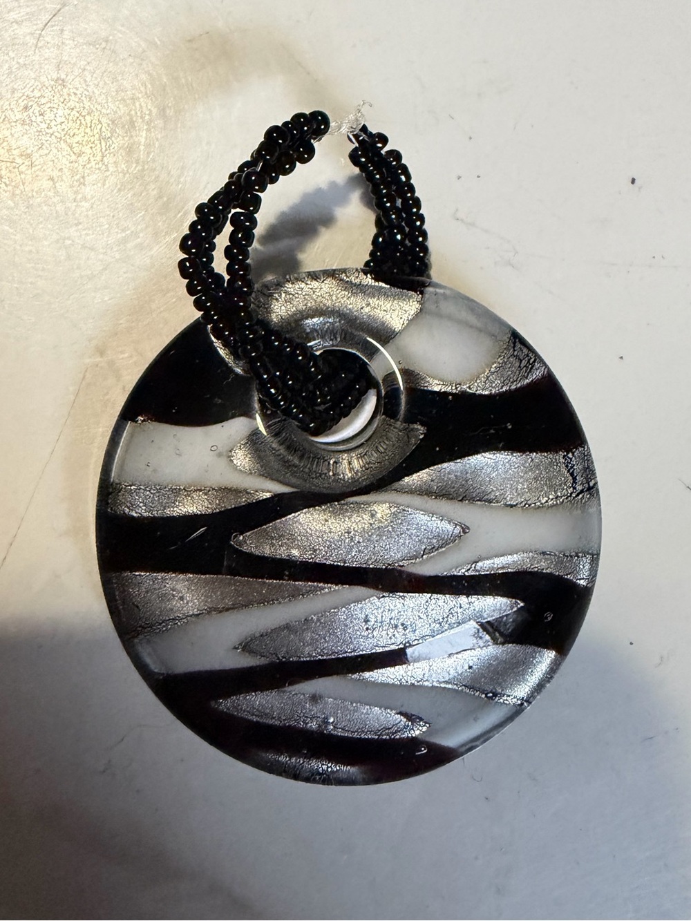 2/$30 Round Black & Silver Zebra Pendant